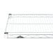 A close-up of a Metro chrome wire shelf with holes in the metal.