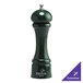 A Chef Specialties pepper mill with a green lid and silver handle.