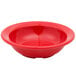 A red Carlisle Dallas Ware melamine fruit bowl.