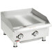 An APW Wyott stainless steel electric countertop griddle on a counter.