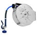 A silver and blue T&S hose attached to a metal hose reel.
