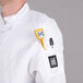 a yellow and white device with buttons
