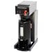 A Bloomfield commercial coffee maker with black and white touchpad controls.