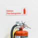 a fire extinguisher on a wall