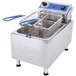 a deep fryer with a blue handle