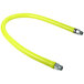 A yellow flexible hose with silver fittings.