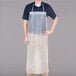 A man wearing a San Jamar clear plastic dishwasher apron.