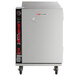 A large stainless steel Metro heated holding cabinet on wheels.