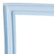 A close-up of a white magnetic door gasket with a blue frame.