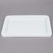 a white rectangular object on a gray background