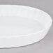 A white fluted oval CAC china serving dish.