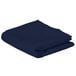 A folded navy blue rectangular table cover.