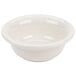 A Hall China ivory pot pie bowl with a white surface.