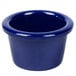 A navy blue plastic Thunder Group ramekin.