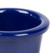 A close-up of a navy blue Thunder Group melamine ramekin.