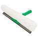A white and green Unger Visa Versa window squeegee with a white cloth.