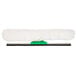 A white fur strip on a green Unger Visa Versa squeegee base.
