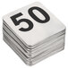 A stack of Tablecraft stainless steel table number cards with the number 50 on top.