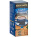 A blue box of Bigelow English Teatime Decaffeinated Tea on a table with a cup of tea.