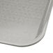 A Carlisle gray standard plastic fast food tray with a pattern on it.