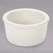 A Tuxton eggshell white china ramekin.