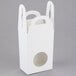 A white box with a circular window on the top.