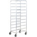 A white metal Winholt platter cart with shelves and wheels.