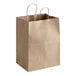 A brown paper bag with handles.