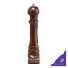 A wooden pepper mill with "President" in script on the front.