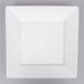 An Arcoroc white porcelain square plate with a white rim.