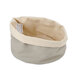 An American Metalcraft round warming stone in a fabric bread basket.