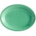 A green oval china coupe platter with a white center and stripes.