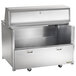 A stainless steel Traulsen school milk cooler with casters.