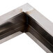 A Wells stainless steel slope top adapter.