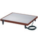 A rectangular white and brown Hatco heated shelf warmer on a table.