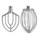 A silver metal whisk attached to a Hobart Legacy+ floor mixer.