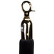 A black and gold metal stanchion rope with black leather ends.