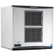 A white and black rectangular Scotsman air cooled medium cube ice machine with vents.