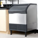 A Scotsman undercounter ice maker on a counter in a kitchen.
