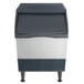 A grey and black Scotsman undercounter ice machine.