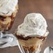 A glass cup with a sundae made with Kraft Heinz Marshmallow Creme.
