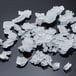 A close up of a pile of flake ice from a Scotsman air cooled ice machine.