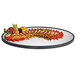 A Cal-Mil oval mirror tray with a raised black rim holding a plate of food on a table.
