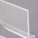A clear acrylic Cal-Mil display stand.