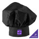 A black Choice chef hat with a purple logo on a counter.