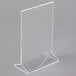 A clear plastic Cal-Mil display stand.