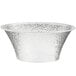 A clear acrylic bowl with a textured surface and a metal rim.