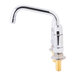 A silver Equip by T&S deck mount swing faucet with two silver and gold handles.
