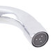 A close-up of a chrome Equip by T&S deck-mount swing faucet with adjustable centers.