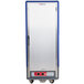 A Metro C5 3 Series heated holding cabinet with a blue and silver door.